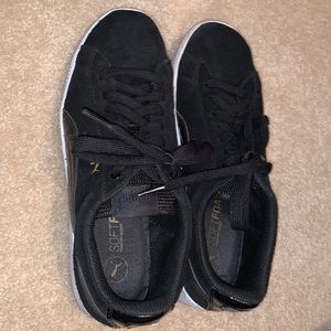 Black wedged Puma sneakers